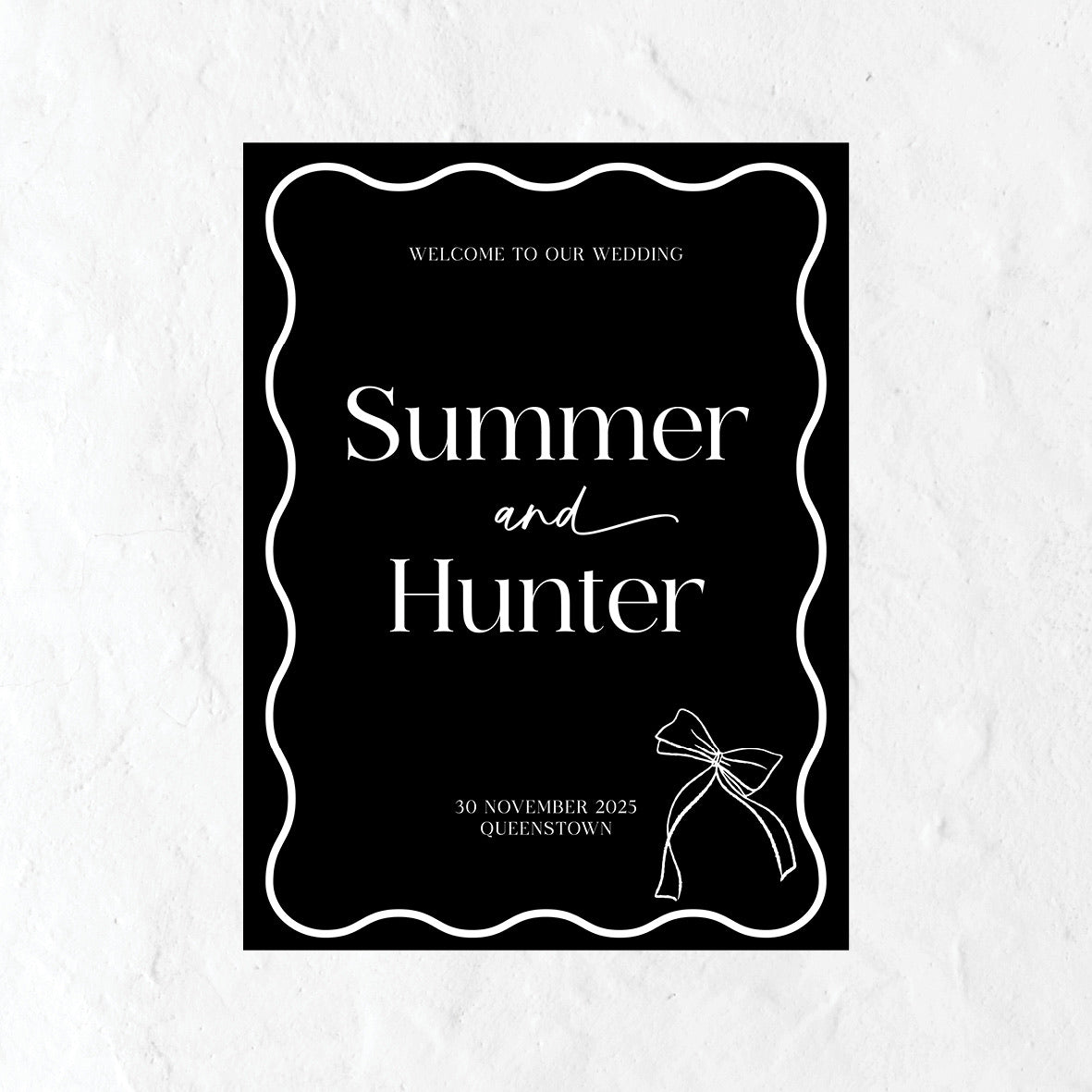 Black Wedding welcome sign with a bow icon