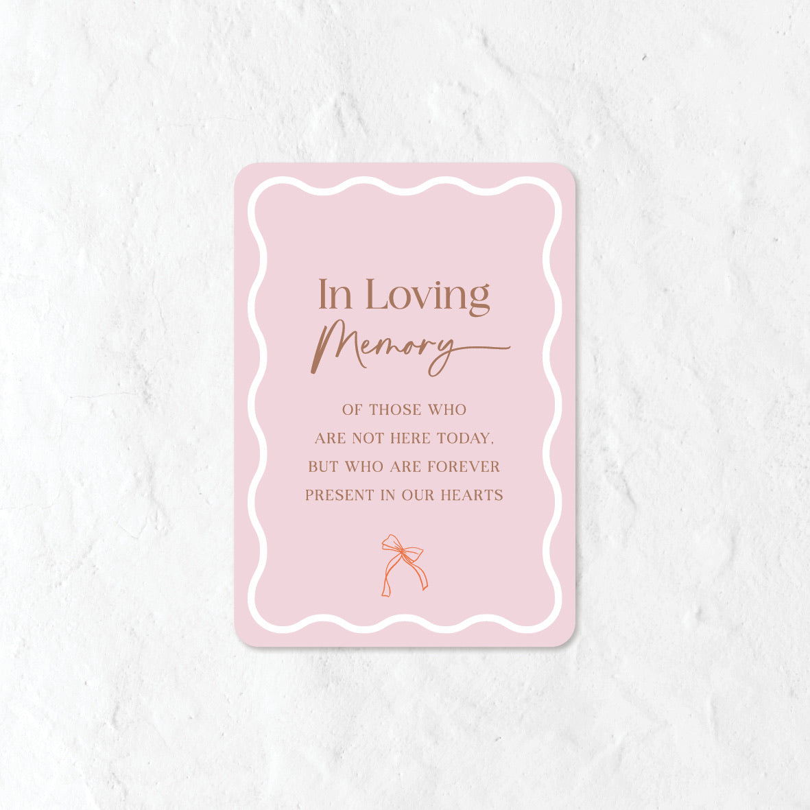 Pink In Loving Memory sign on a white background