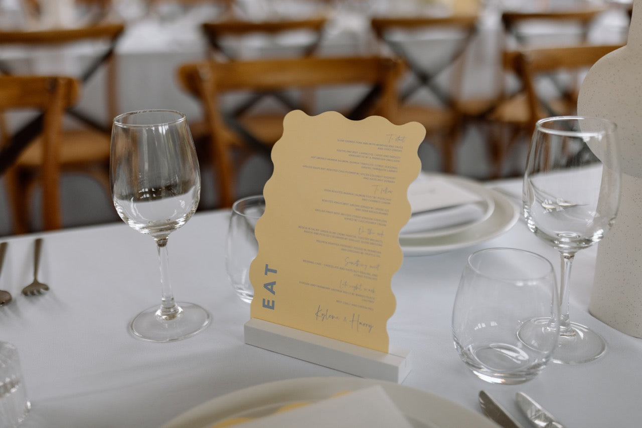 Kylene and Harry pastel yellow and blue food Menu at the Winehouse in Queenstown