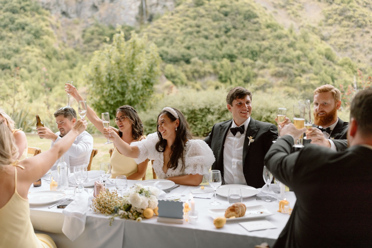 Kylene and Harry Wedding reception with a scenic background  at the Winehouse in Queenstown