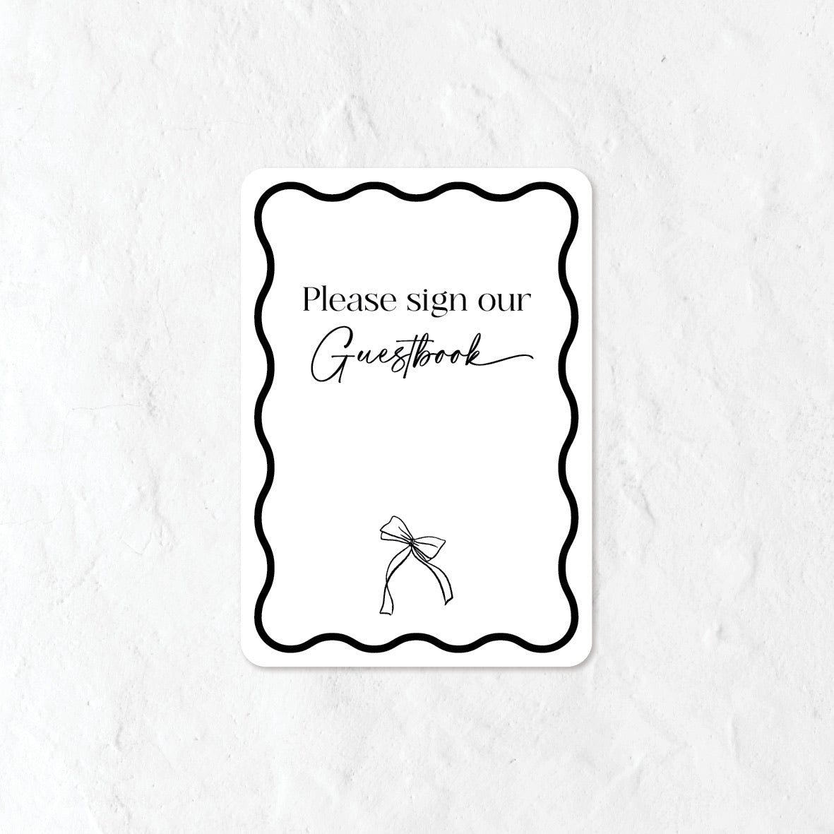 Please sign our Guestbook sign in black   and white with a bow illustration
