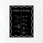 Black and white Order of Events sign with a bow icon