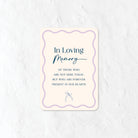 In Loving Memory sign text in blue and pastel purple colours
