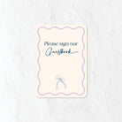 Please sign our Guestbook in a pastel blue and purple colour palette