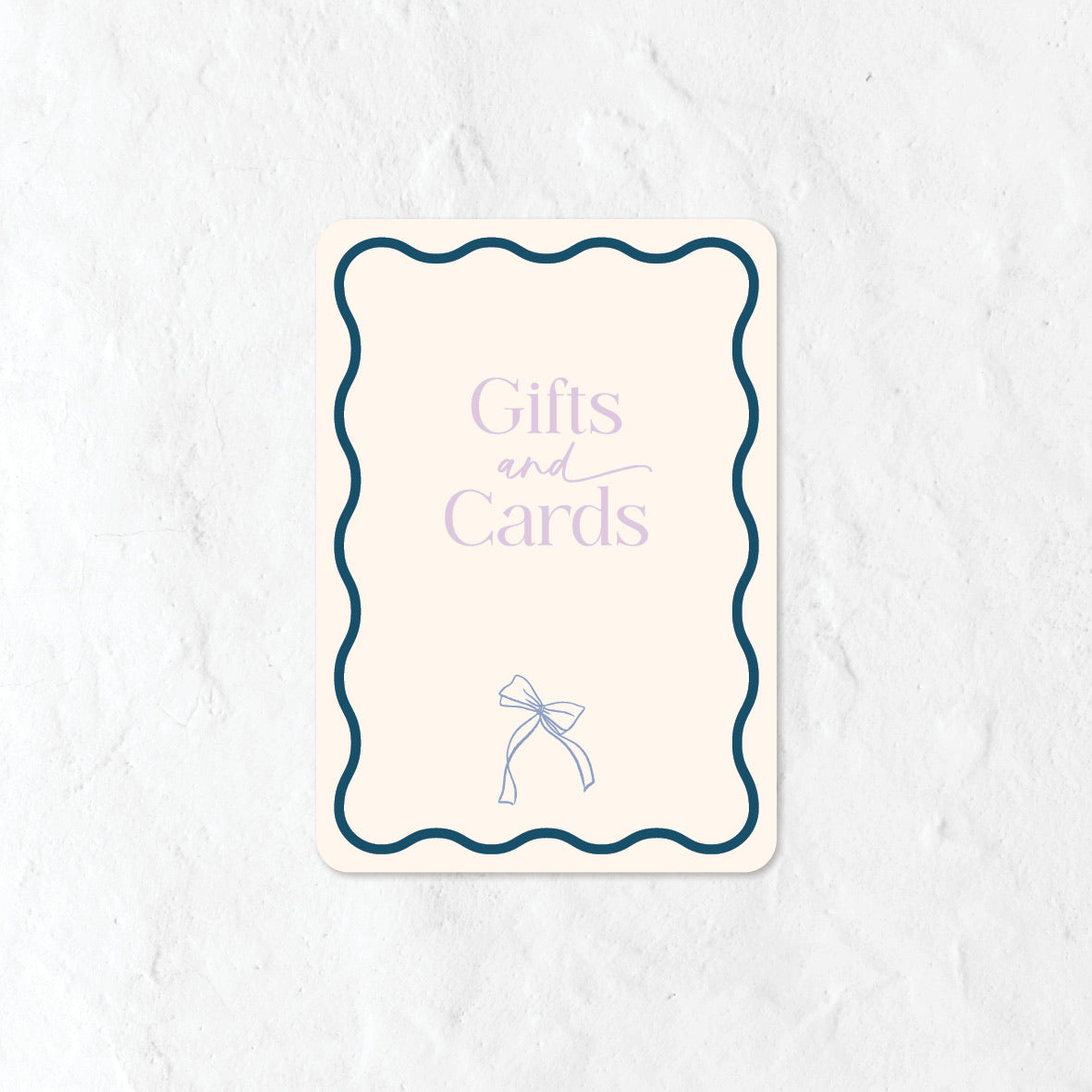Gifts and Cards sign in a pastel purple and blue palette and a bow illustration 