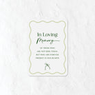 In Loving Memory sign with a green colour palette and a bow icon 