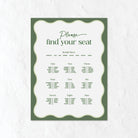 Seating plan for a wedding with a sage green and dark  green elements 