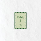 Green table number  with 'Table 1' text on a textured white background