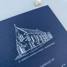 Navy blue card with white line drawing of a church and text on a light blue background