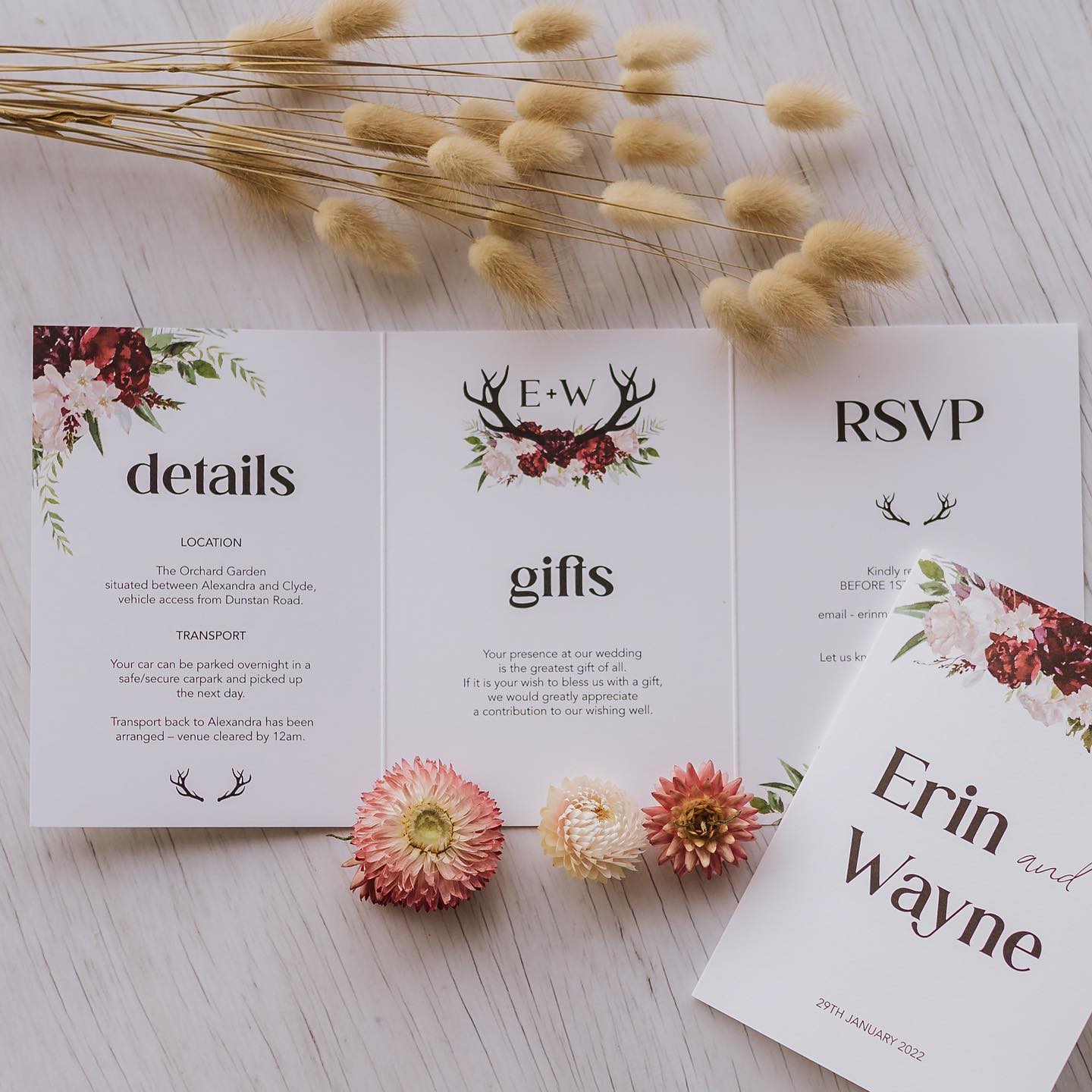 Custom designed tri fold wedding invitation with deep read accents