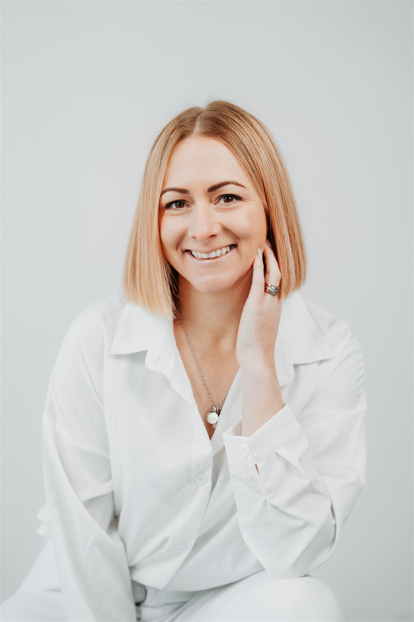 Remotelea Creative styled shoot Leanne wearing a white blouse close up portrait
