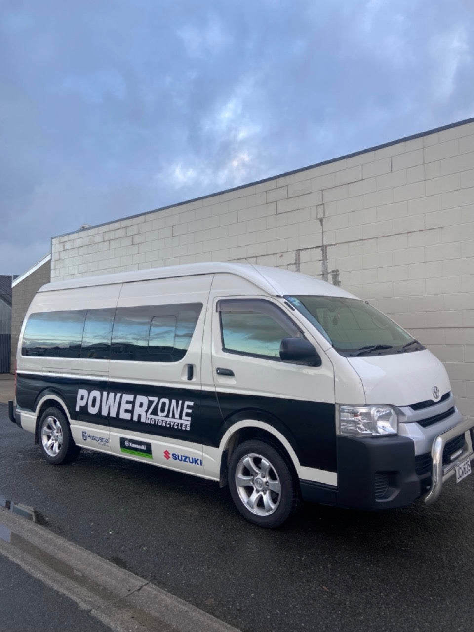 Van with PowerZone branding sign written by Remotelea Creative