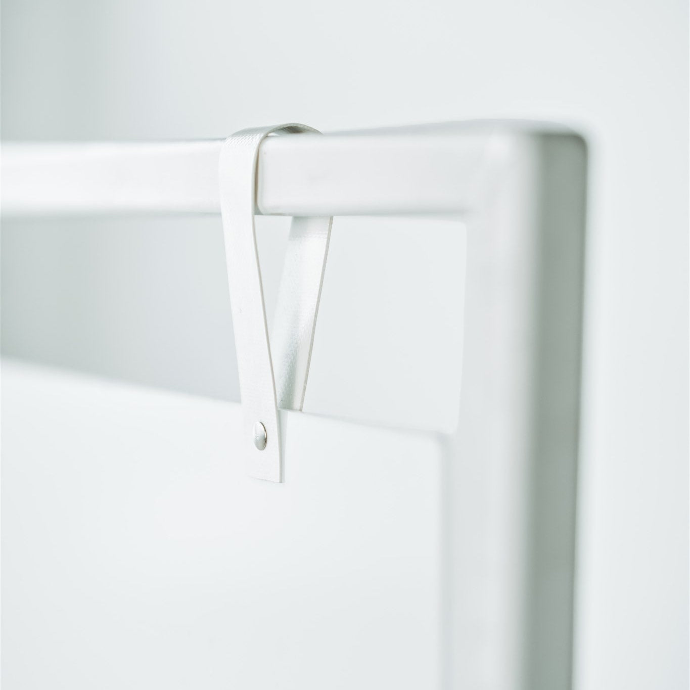 white frame with white leather straps