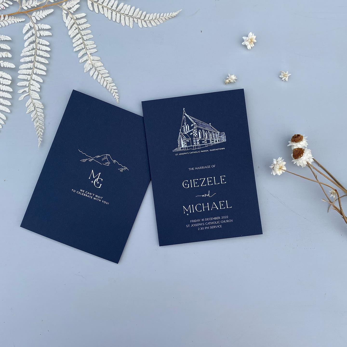 front and back navy blue wedding invitations with white text and custom elements